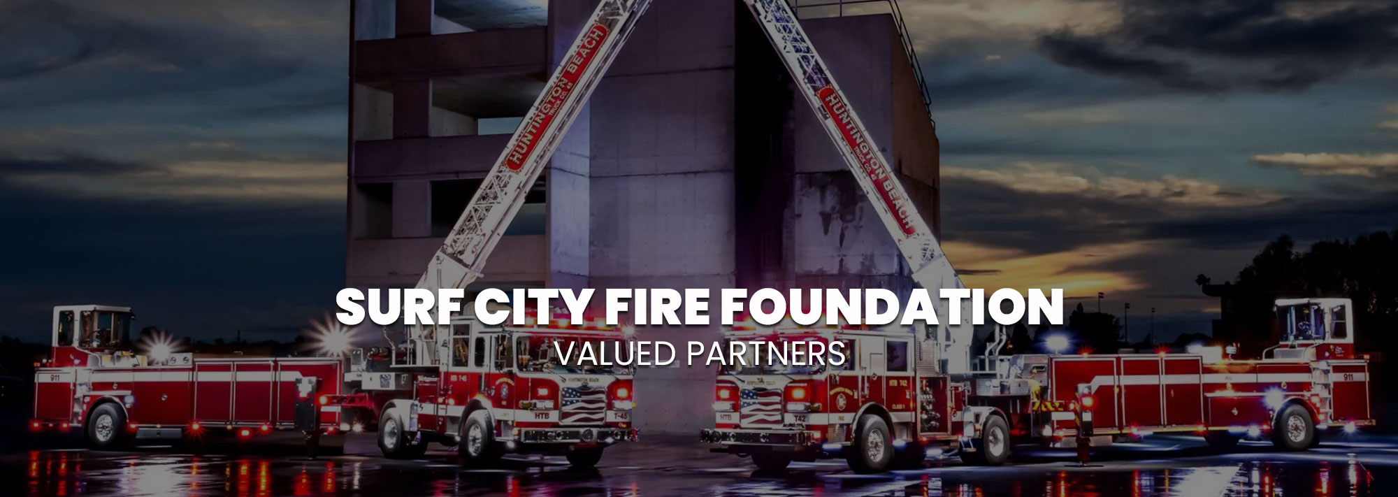 Valued Partners text over firetrucks background